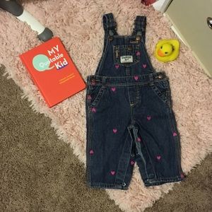 Overalls with hearts stitched in